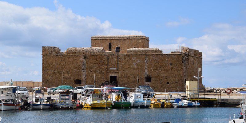 The castle of Pafos early in the morning with reflection on the water, Cyprus